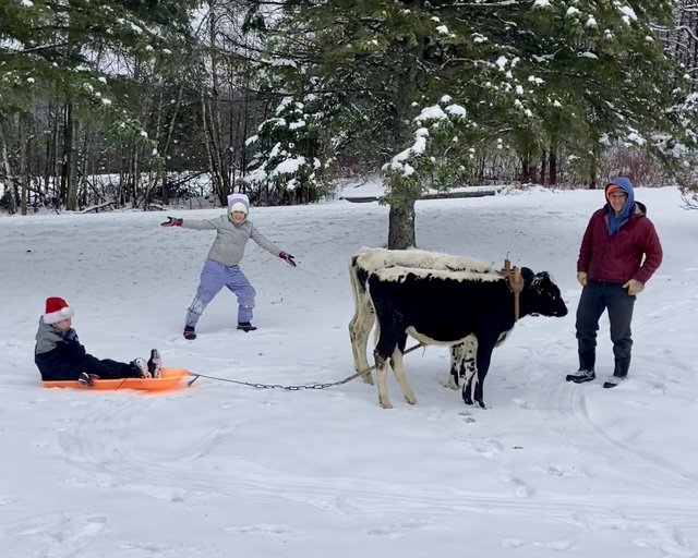 Picture%204%20-%20Family%20Sledding%20with%20team.jpeg